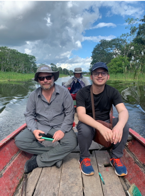 Juan Felipe Guhl (SINCHI Institute) Marco Herndon (MCP’24) on a boat traveling through the Amazon River. 